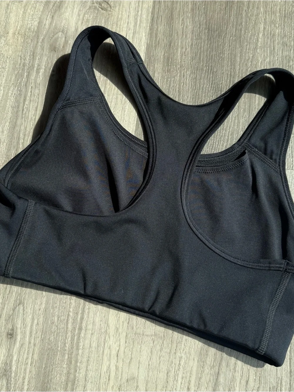 EUC Nike Black Racerback Sports Bra with White Swoosh